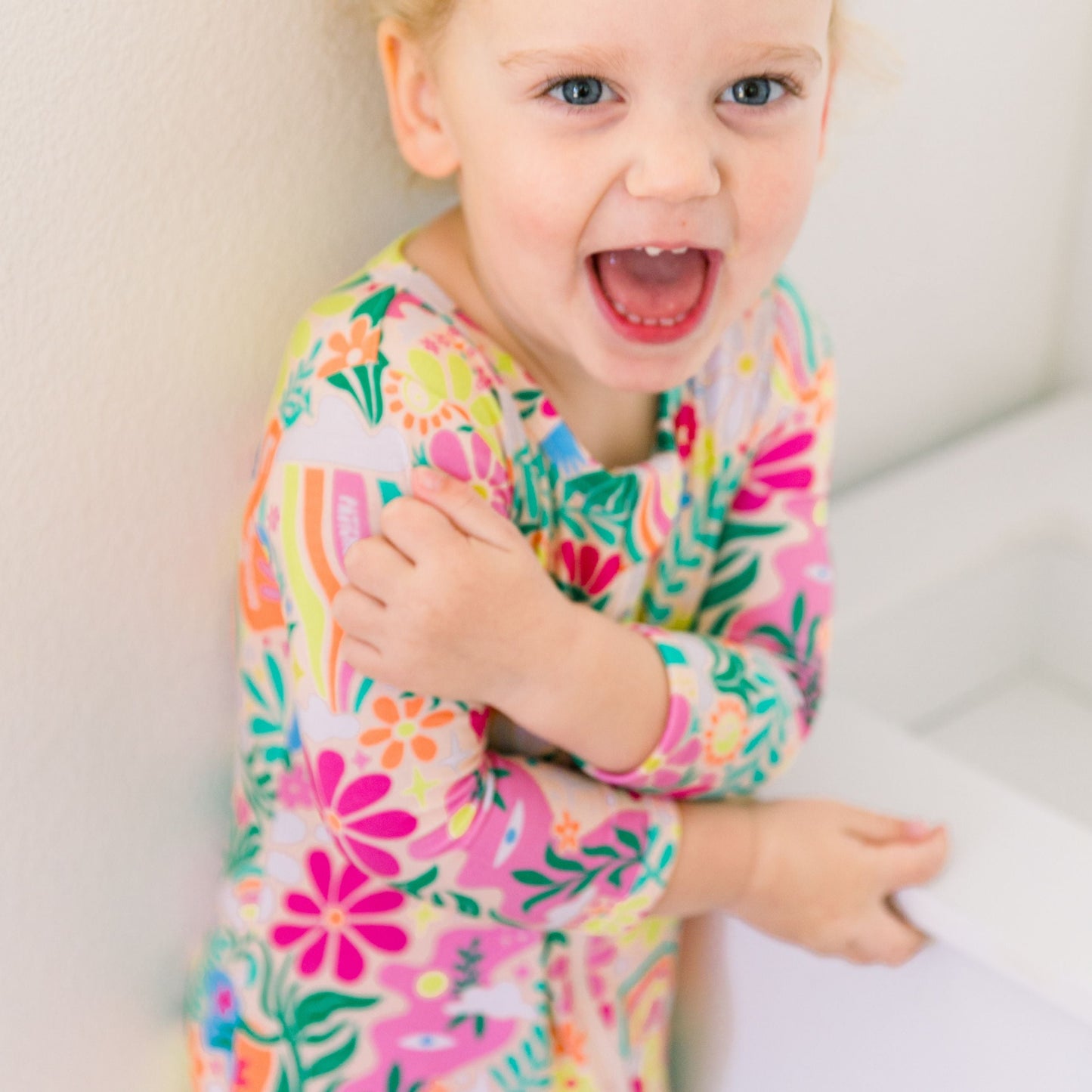 The Second-Skin Footless Romper | Rainbow Daisy Babe